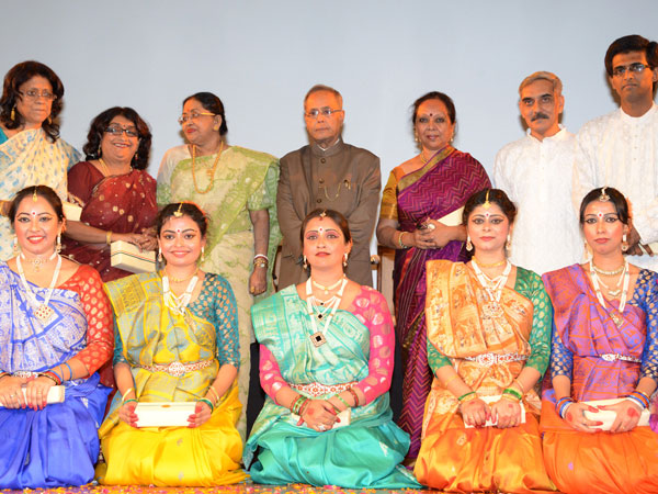 Mukerjee poses for a photo op