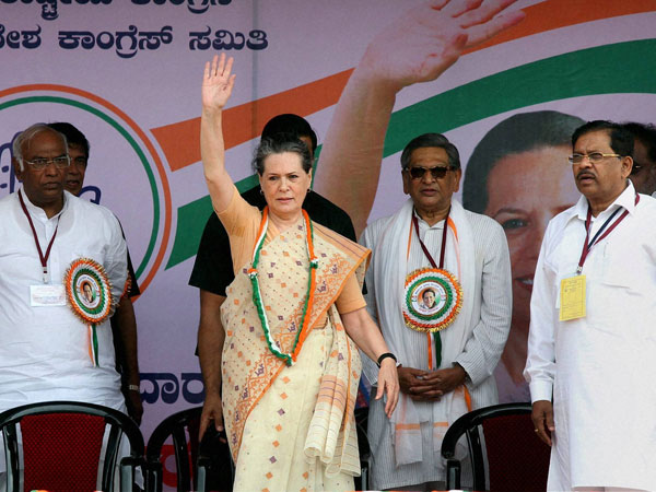 Sonia waves to Congress supporters in Mandya