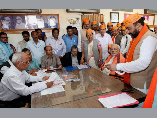 Gujarat Chief Minister Narendra Modi greets Shambhuprasad Tundiya