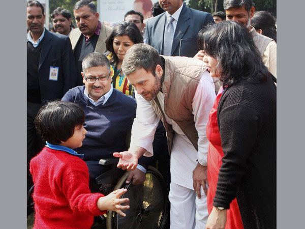 Rahul Gandhi greets a disabled child 