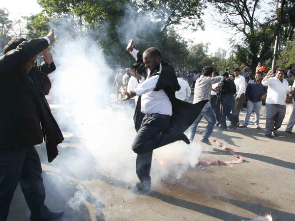 People burst crackers in joy