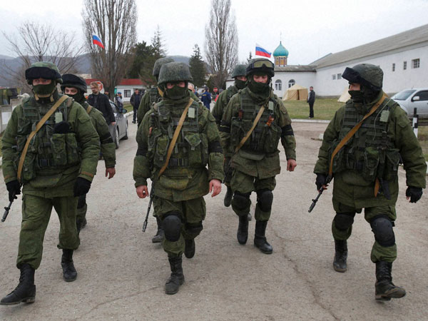 Russian soldiers guard Ukraine's infantry base 
