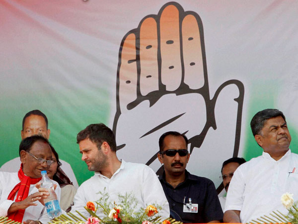 Rahul Gandhi along with party workers during an election rally