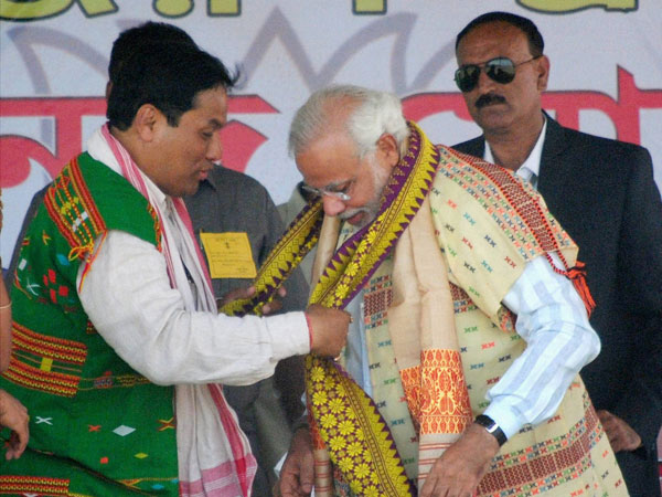  Narendra Modi being felicitated by Lakhimpur Lok Sabha candidate