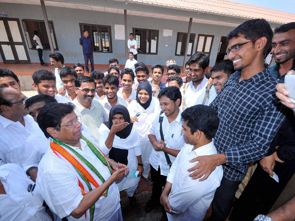 Malappuram UDF candidate E Ahmed interacts with people