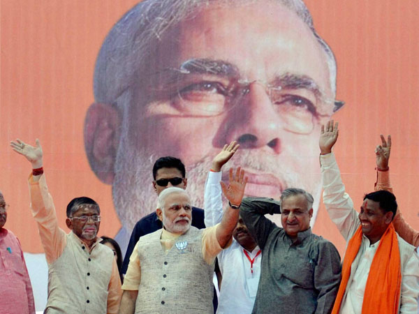 Narendra Modi with party leaders during an election rally in Bareilly