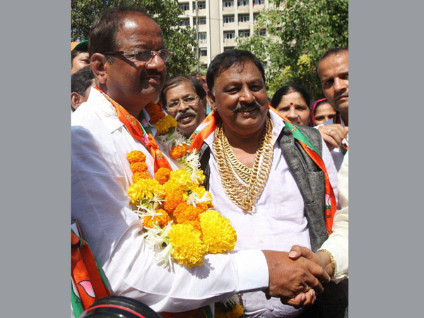 BJP leader Gopal Shetty (L) filed his nomination papers