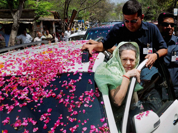 Sonia Gandhi is greeted by party workers 