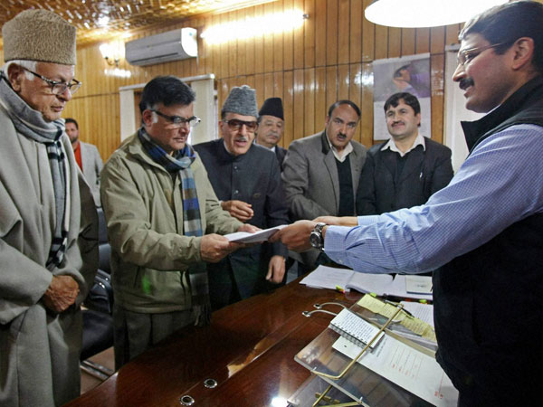 Mehboob Beig flanked by party president Farooq Abdullah