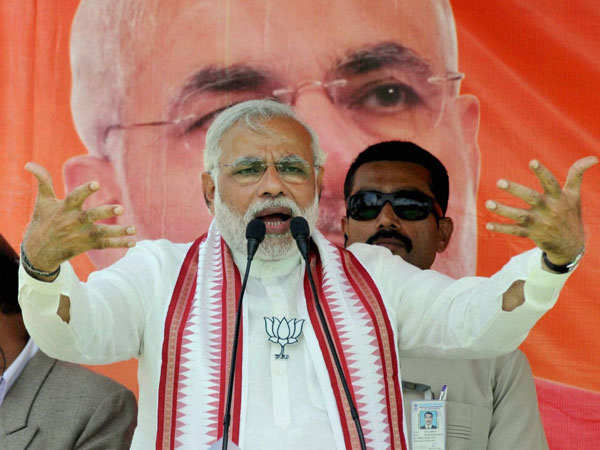 Narendra Modi addresses an election campaign rally