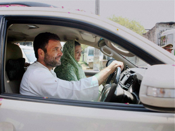 Sonia Gandhi with party Vice President Rahul Gandhi during her nomination