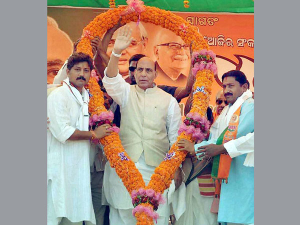 BJP National President Rajnath Singh being garlanded