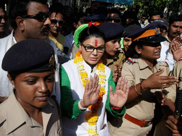 Rakhi Sawant greets her supporters after filing her nomination papers