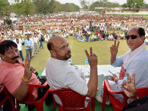 AGP leader Atul Bora shows victory sign during an election campaign