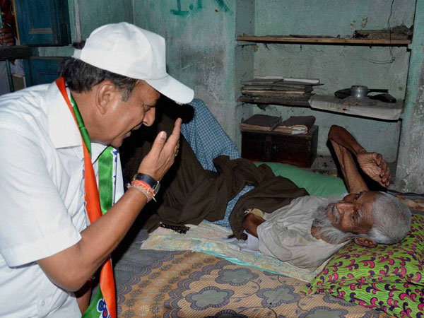 Dinesh Trivedi from Barrackpore interacts with an old voter
