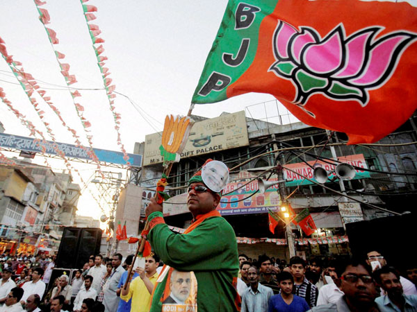 A BJP's supporter during an election campaign rally