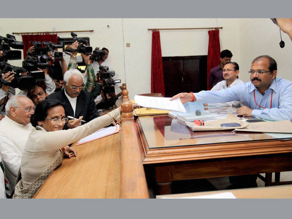 Rita Bahuguna Joshi with senior leader Motilal Vohra filing her nomination