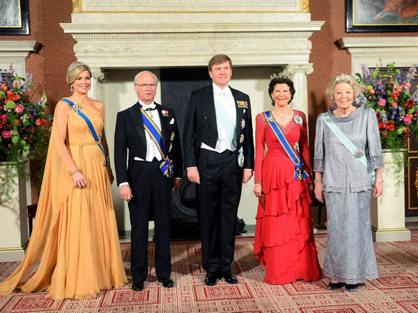 Royalty smile for the shutterbugs