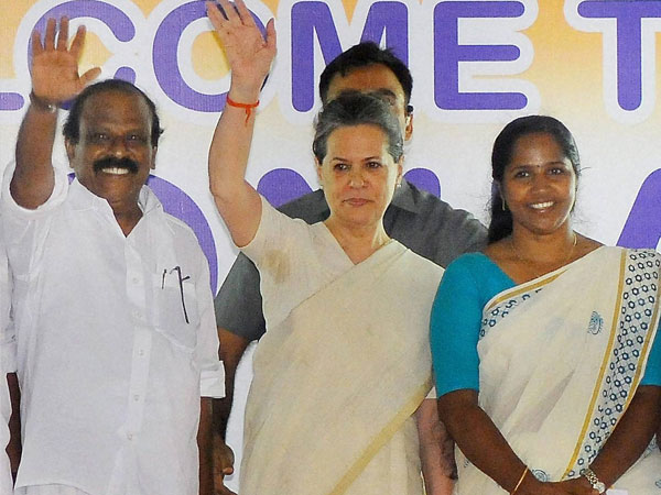 Sonia Gandhi waves to people at an election meeting in Thrissur Sonia Gandhi waves to people at an election meeting in Thrissur