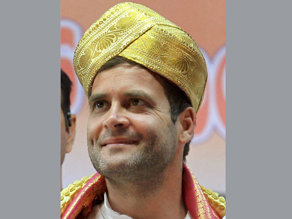 Rahul Gandhi wears a Mysore peta during an election rally Rahul Gandhi wears a Mysore peta during an election rally