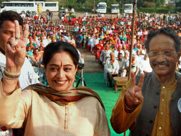 Kirron Kher with party leader BC Khanduri during an election campaign Kirron Kher with party leader BC Khanduri during an election campaign