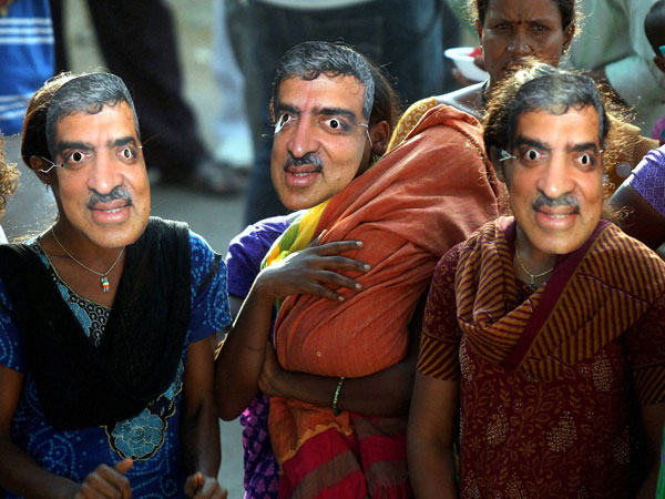 Supporters wear mask of Nandan Nilekani Congress candidate Supporters wear mask of Nandan Nilekani Congress candidate
