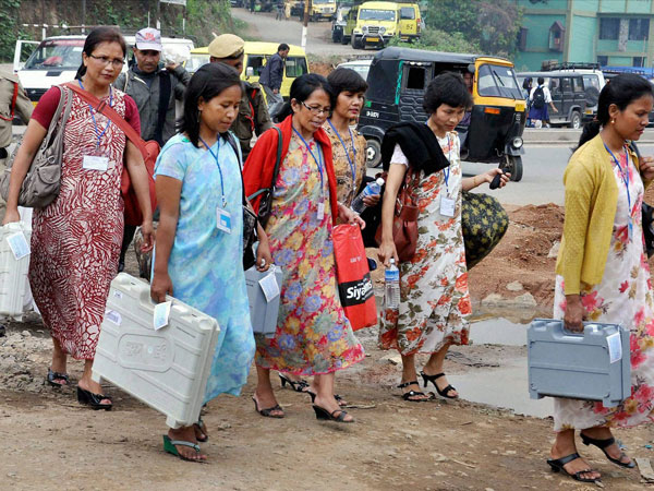 Electronic Voting Machine (EVM) to a polling center ahead of voting for Lok Sabha election Electronic Voting Machine (EVM) to a polling center ahead of voting for Lok Sabha election