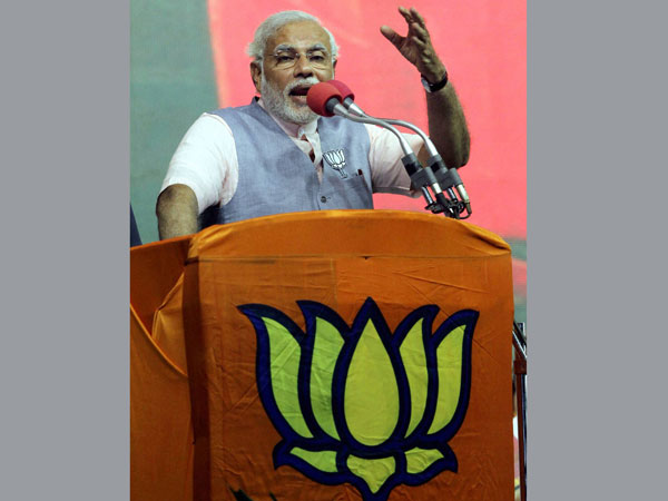 Narendra Modi addresses an election rally in Mysore