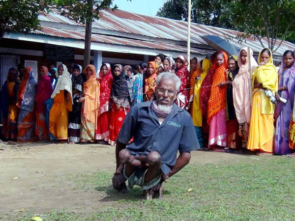 A handicapped person coming to caste his vote