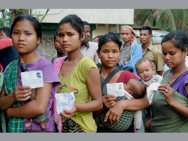 People show their voter identity card