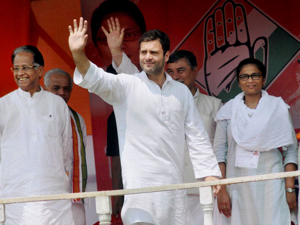Rahul Gandhi waves during an election rally