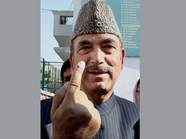 Ghulam Nabi Azad shows his ink-marked finger