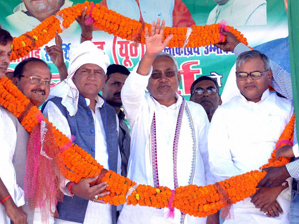 Nitish Kumar being garlanded during an election campaign Nitish Kumar being garlanded during an election campaign