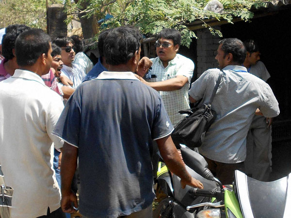 Trinamool Congress supporters attack Election Commission officials Trinamool Congress supporters attack Election Commission officials