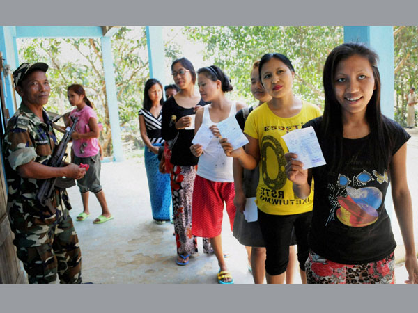 Voters wait to cast their votes for Lok Sabha polls in Aizawl Voters wait to cast their votes for Lok Sabha polls in Aizawl