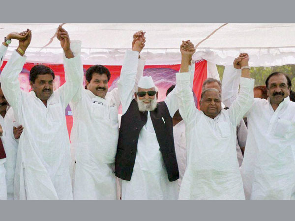 Mulayam Singh Yadav with party leaders at an election rally