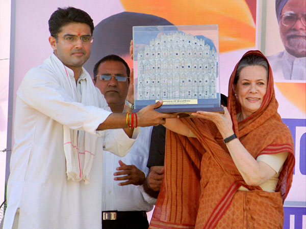 Sonia Gandhi being presented a memento 