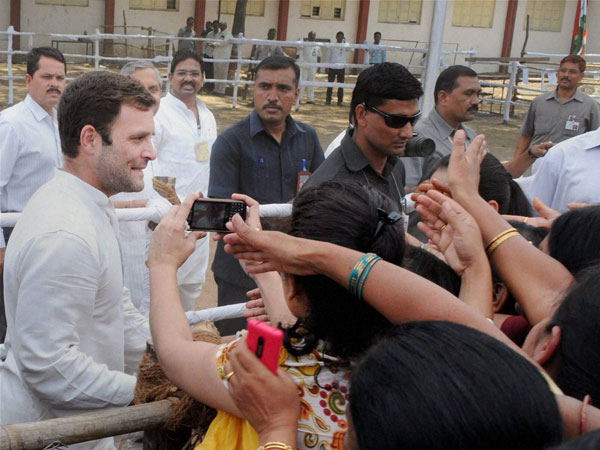 Rahul Gandhi crossing barricades while meeting supporters