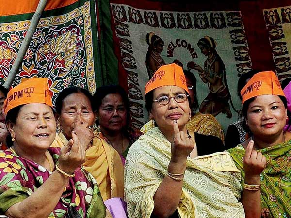 BJP supporters show thir ink-mark fingers at Imphal