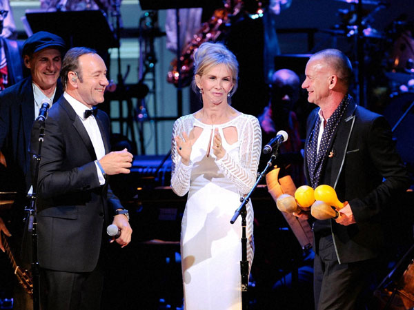 Actor Kevin Spacey, Trudie Styler and Sting perform together