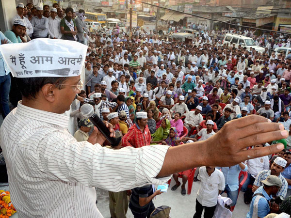 Arvind Kejriwal addresses supporters during his election campaign