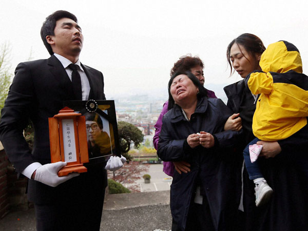 Families of the victims of the sunken ferry grieve