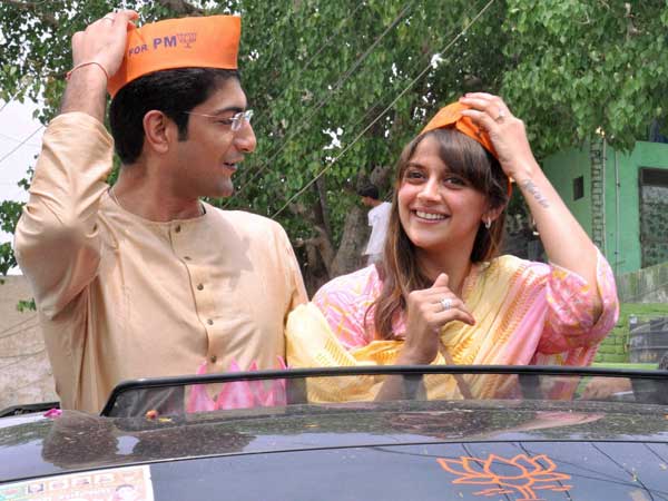 Ahana Deol with her husband during a road show