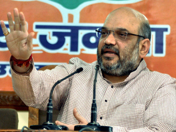 Amit Shah addresses a press conference in Lucknow