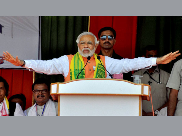Narendra Modi addresses an election campaign rally