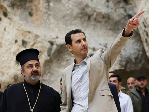 Assad visits historic Christian village