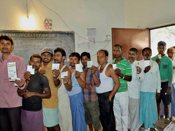 Voter waiting a long queue at polling station