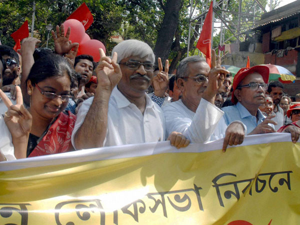 Abul Hasnat flash victory signs as they arrive to file their nomination