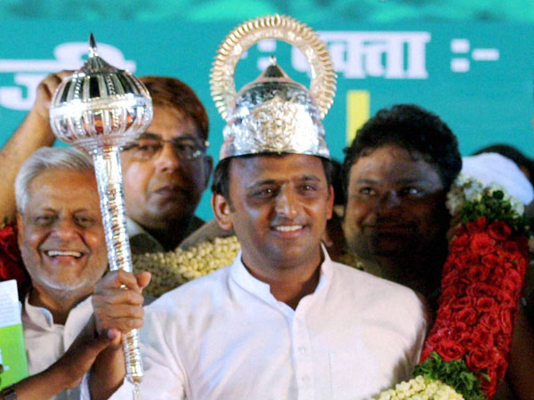 Akhilesh Yadav is presented a mace during an election rally