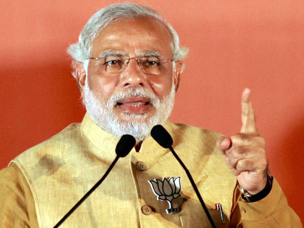 Narendra Modi addresses an election campaign